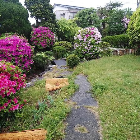 בפו Yokoso Ryokan מראה חיצוני תמונה